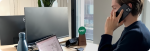 An Optiml Sales Man on the phone with a customer